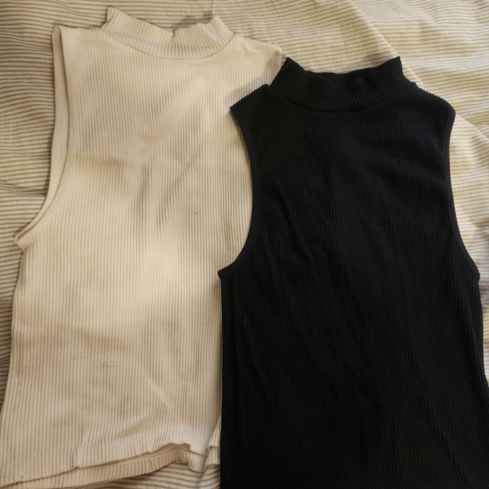 two mini turttleneck sleeveless tops